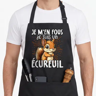 Tablier de cuisine noir avec illustration d'écureuil mignon et texte Je m'en fous je suis un écureuil en lettres blanches.
