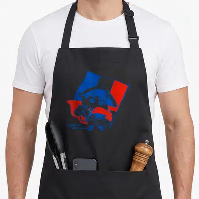 Tablier de cuisine noir avec Shin-chan en uniforme napoléonien tenant un drapeau tricolore et la mention Comment t'allez vous.