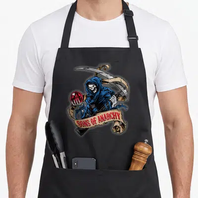 Tablier de cuisine noir avec le Reaper bleu, une faucille et le logo Sons of Anarchy sur un ruban beige.