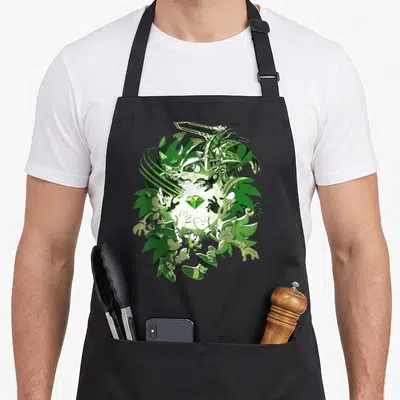 Tablier de cuisine noir avec une illustration circulaire de Sonic à travers les époques et une gemme verte centrale.