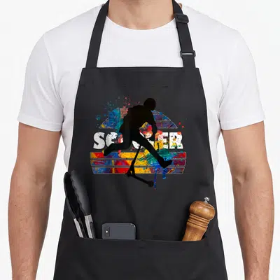 Tablier de cuisine noir avec silhouette scooter freestyle et texte SCOOTER coloré style graffiti.