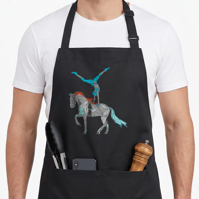 Tablier de cuisine noir avec illustration géométrique d'un cavalier effectuant une voltige à dos de cheval aux couleurs bleues et oranges.