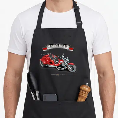 Tablier de cuisine noir avec illustration d'un trike rouge et bannière Live to ride & ride to live