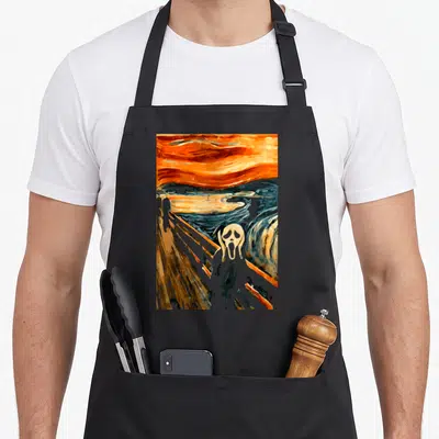 Tablier de cuisine noir avec une reproduction stylisée du Cri de Munch en orange et bleu.