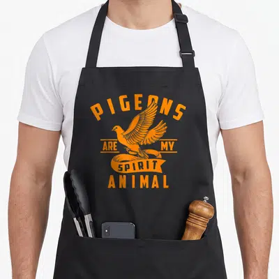 Tablier de cuisine noir avec illustration orange d'un pigeon en vol et texte Cool Pigeons Are My Spirit Animal.