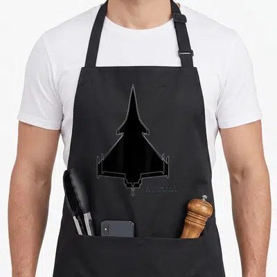 Tablier de cuisine noir avec silhouette Dassault Rafale et texte Aircraft Design Series en bas à droite.