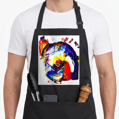 Tablier de cuisine noir avec une impression abstraite multicolore évoquant des coups de pinceau expressifs et des éclaboussures artistiques sur fond blanc.