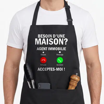 Tablier de cuisine noir avec interface d'appel téléphonique agent immobilier et texte besoin d'une maison acceptes-moi