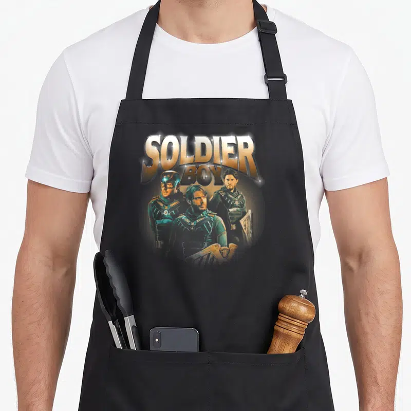Tablier de cuisine noir avec illustration Soldier Boy et texte doré scintillant style années 90
