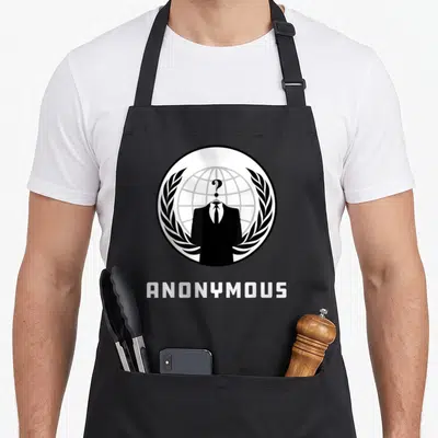 Tablier de cuisine noir avec le logo Anonymous représentant un silhouette en costume devant un globe et des branches de laurier.