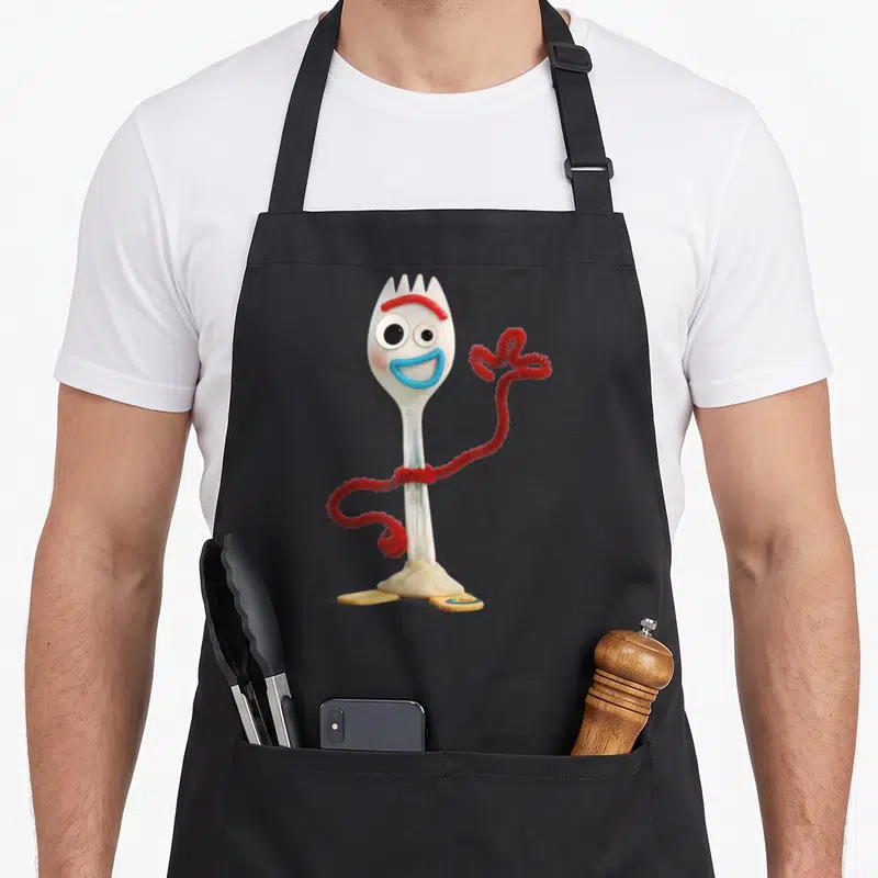 Tablier de cuisine noir avec Forky fourchette blanche souriante bras en feutre rouge et pieds en papier carton coloré