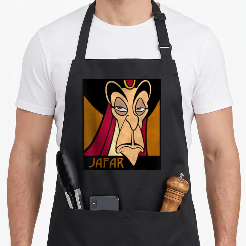 Tablier de cuisine noir avec portrait stylisé de Jafar et son nom en bas au centre.