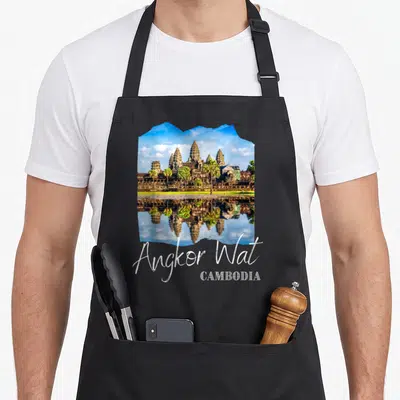 Tablier de cuisine noir avec une illustration du temple Angkor Wat au Cambodge et son reflet dans l'eau.