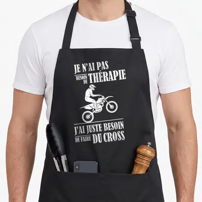 Tablier de cuisine noir avec une illustration blanche d'un motocrosseur en l'air et le texte Je n'ai pas besoin de thérapie.