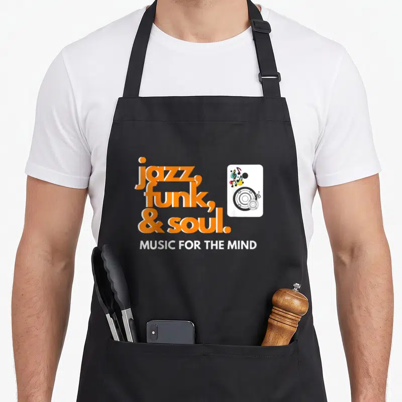 Tablier de cuisine noir avec inscription orange jazz funk et soul et illustration de haut-parleur colorée.