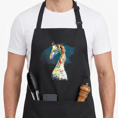 Tablier de cuisine noir avec une illustration artistique colorée représentant une girafe aux teintes vives et au style aquarelle.