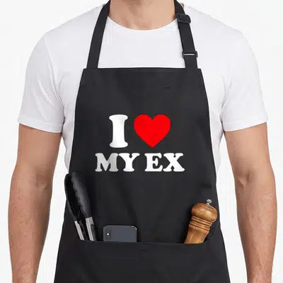 Tablier de cuisine noir avec inscription blanche I Love My Ex et un grand cœur rouge au centre du motif imprimé.