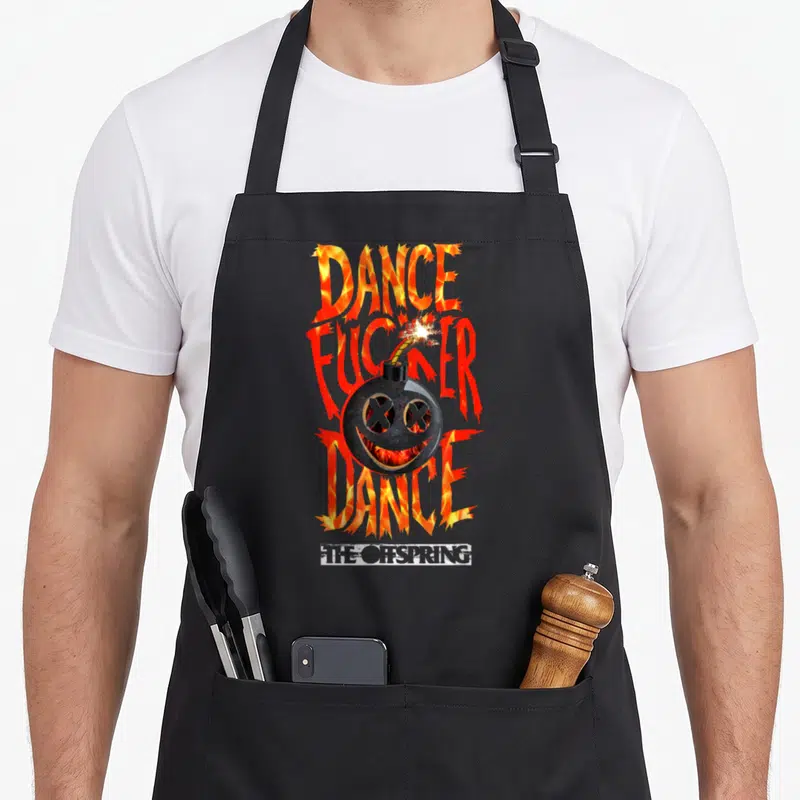 Tablier de cuisine noir avec illustration bombe fumante texte Dance Fucker Dance et phrase La progéniture tu Vas Aller Loin Gamin imprimés en orange.