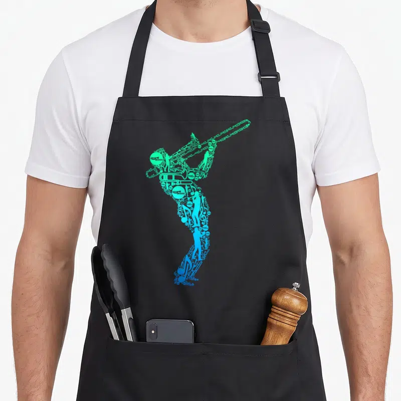 Tablier de cuisine noir avec un tromboniste jazz composé de notes et d'éléments instrumentaux en dégradé bleu et vert.