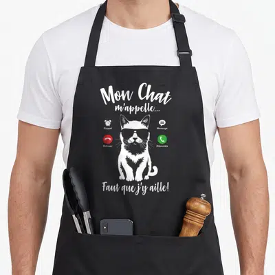 Tablier de cuisine noir avec silhouette de chat aux lunettes de soleil et texte Mon Chat m'appelle Faut que j'y aille.