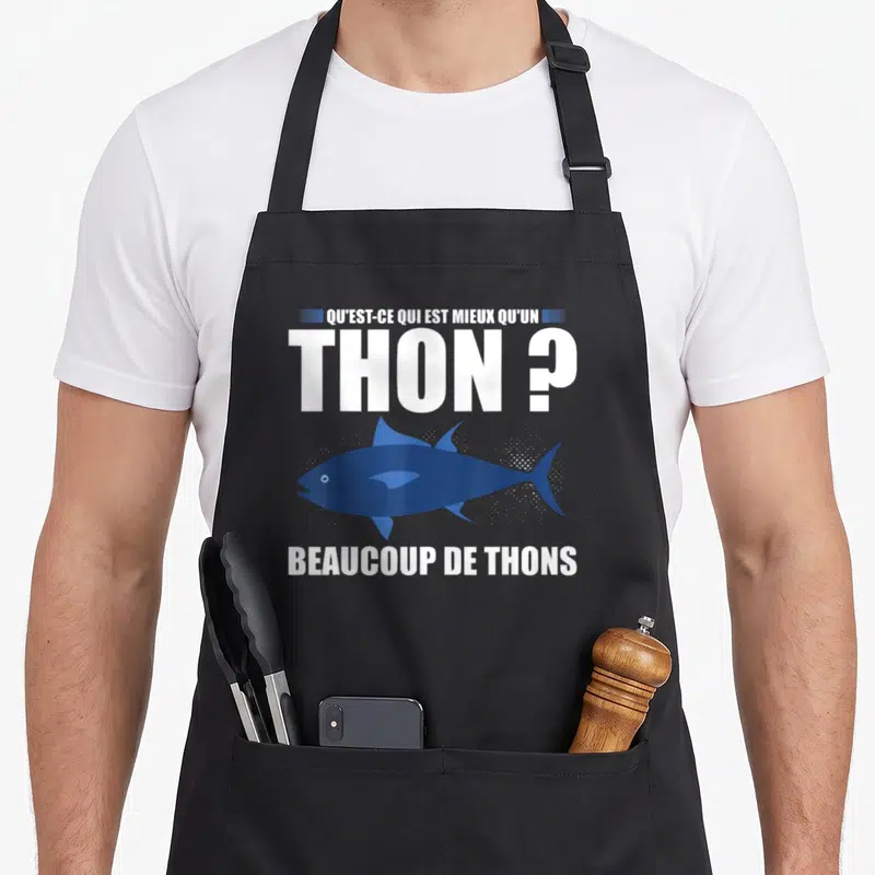 Tablier de cuisine noir avec un thon bleu et le texte Qu'est-ce qui est mieux qu'un thon Beaucoup de thons