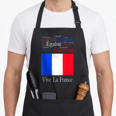 Tablier de cuisine noir avec nuage de mots Liberty et drapeau français tricolore en bas.