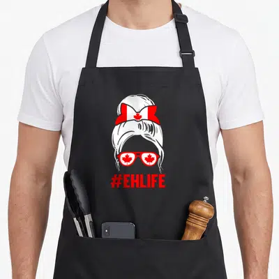Tablier de cuisine noir avec illustration chignoncanadienne lunettes feuilles d'érable et hashtag rouge #EHLIFE