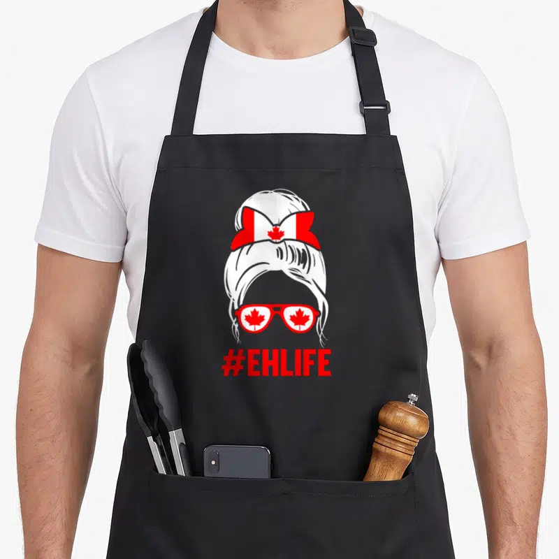 Tablier de cuisine noir avec illustration chignoncanadienne lunettes feuilles d'érable et hashtag rouge #EHLIFE