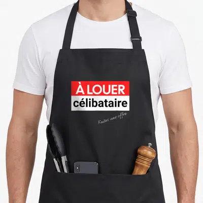 Tablier de cuisine noir avec un motif rectangulaire rouge et blanc affichant le texte À LOUER célibataire et Faites une offre en bas.