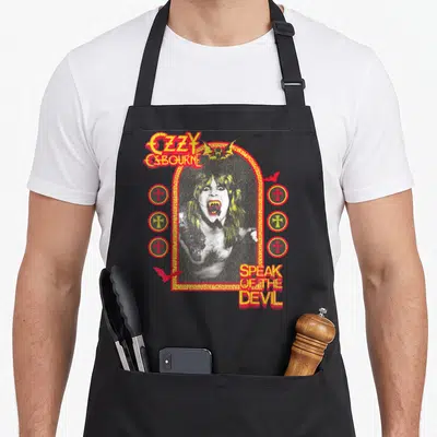 Tablier de cuisine noir avec illustration Ozzy Osbourne Speak of the Devil Ringer aux couleurs vives.