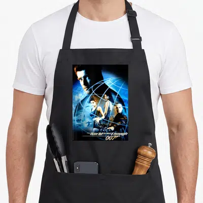 Tablier de cuisine noir avec illustration du film James Bond 007 The World Is Not Enough et le logo 007.