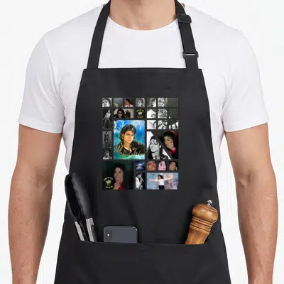 Tablier de cuisine noir avec un collage de photos de Michael Jackson et l'inscription King of Pop High Roller.