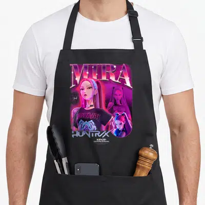 Tablier de cuisine noir avec illustration colorée de Mira et les textes Mira et Huntrx en typographie stylisée.