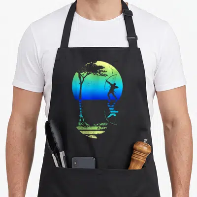 Tablier de cuisine noir avec silhouette d'archer tirant une flèche devant un arbre sur fond dégradé bleu et vert.