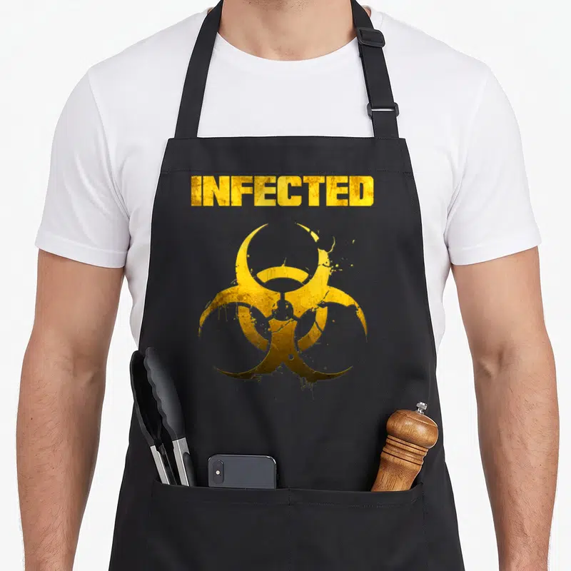 Tablier de cuisine noir avec le texte Infected et un symbole biohazard jaune texturé au centre du torse.