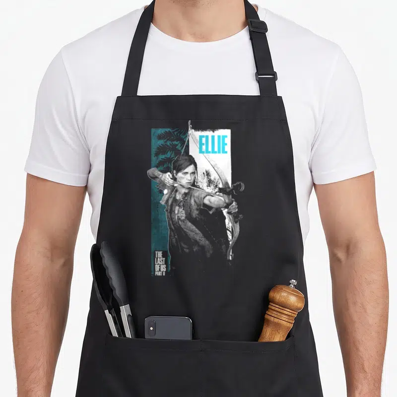 Tablier de cuisine noir avec illustration d'Ellie tirant à l'arc et le texte Ellie en bleu cyan.