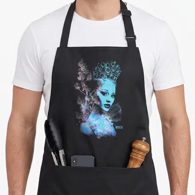 Tablier de cuisine noir avec portrait stylisé de Glinda en bleu cyan et nuances florales roses sur fond uni.