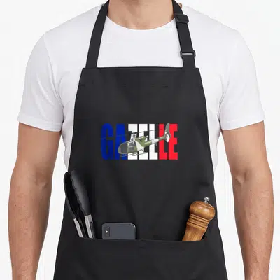Tablier de cuisine noir avec illustration d'un hélicoptère vert traversant les mots GAZELLE en bleu blanc et rouge.