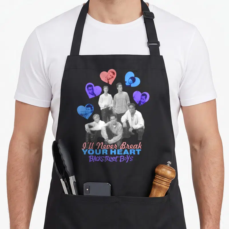 Tablier de cuisine noir avec le groupe Backstreet Boys entouré de cœurs colorés et du texte I'll Never Break Your Heart.