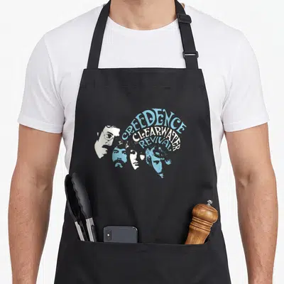 Tablier de cuisine noir avec les visages du groupe Creedence Clearwater Revival en bleu et blanc.