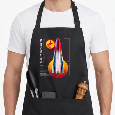 Tablier de cuisine noir avec illustration technique du vaisseau Razorback en rouge et blanc.