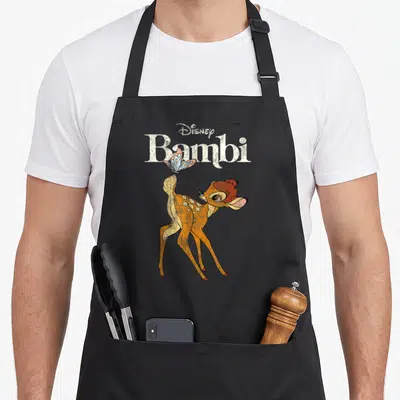 Tablier de cuisine noir avec illustration vintage de Bambi et un papillon coloré sur le dos.