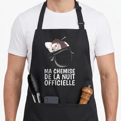 Tablier de cuisine noir avec illustration d'un hérisson dormant et texte Ma chemise de la nuit.