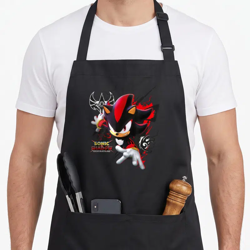 Tablier de cuisine noir avec Shadow le Hérisson en action et le logo Sonic X Shadow Generations.