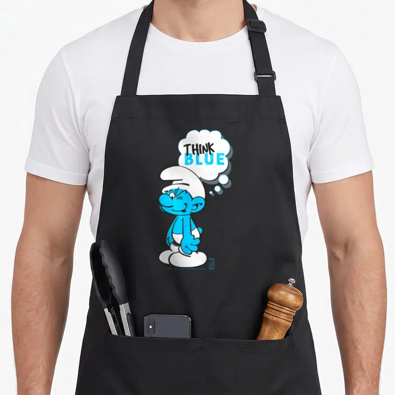 Tablier de cuisine noir avec illustration d'un Schtroumpf bleu et une bulle de pensée Think Blue en lettres noires et cyan.