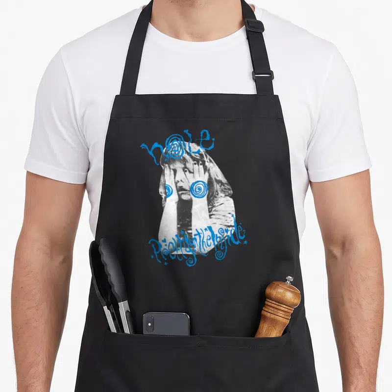 Tablier de cuisine noir avec illustration grise et texte bleu Hole Pretty On The Inside.