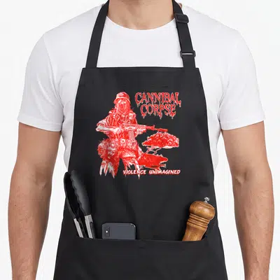 Tablier de cuisine noir avec illustration rouge d'un soldat masqué et le texte Cannibal Corpse Violence Unimagined.