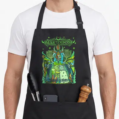 Tablier de cuisine noir avec illustration colorée d'un guerrier cornu tenant une coupe et le texte Mastodon en haut.