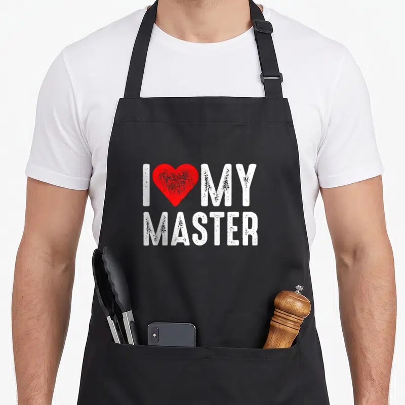 Tablier de cuisine noir avec inscription blanche I Love My Master et un cœur rouge central.