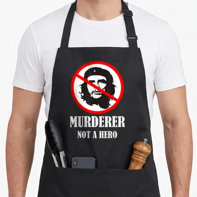 Tablier de cuisine noir avec portrait barré et texte blanc Murderer Not a Hero